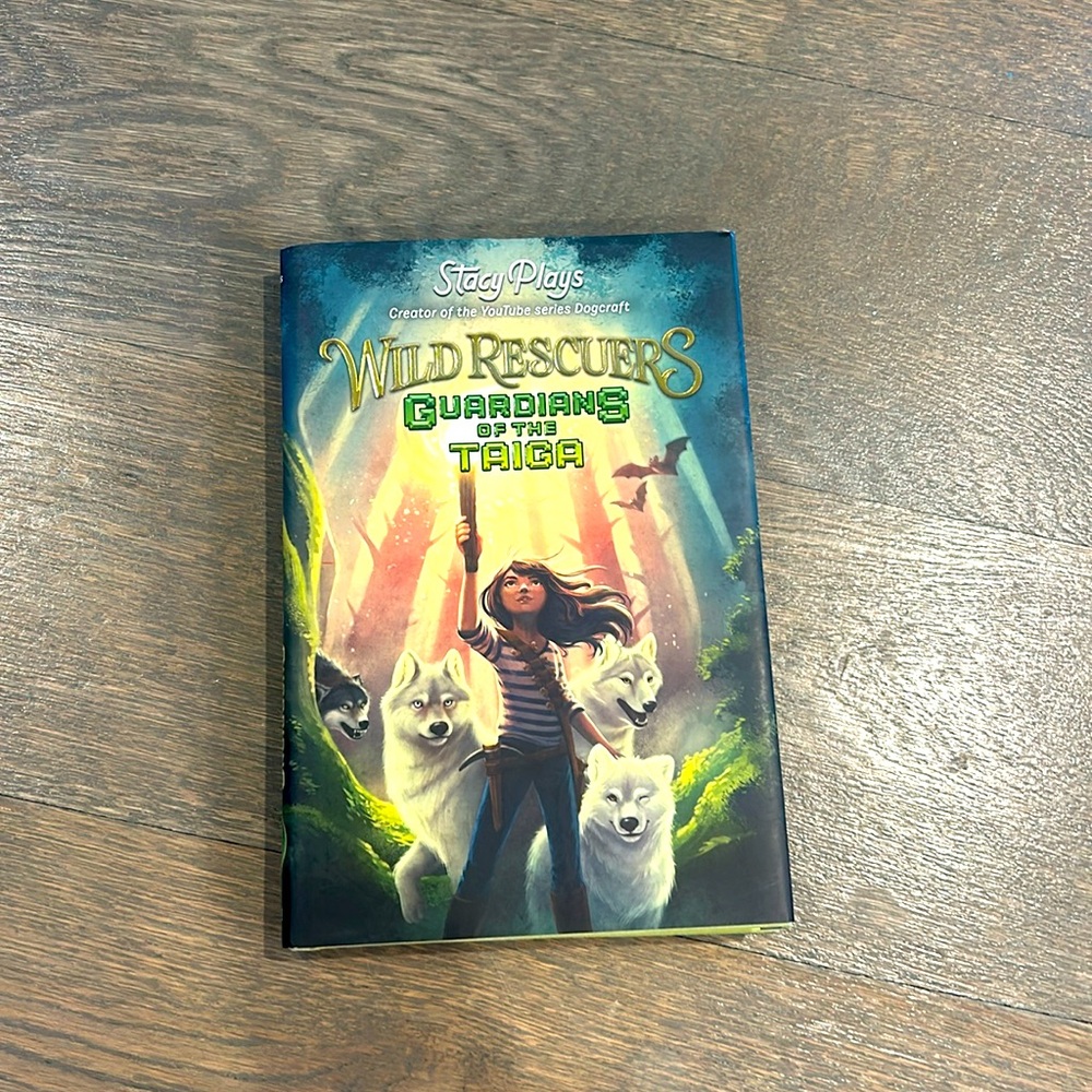 Wild Rescuers Guardians of the Taiga Hardcover Book. Pre loved, in perfect cond
